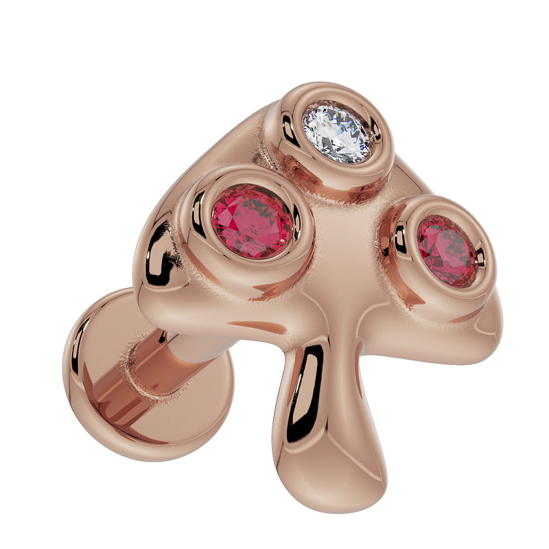 14K rose gold mushroom labret top from above-angle, showing diamond and ruby bezel settings with post