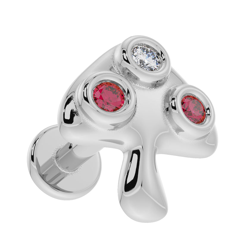 14K white gold mushroom labret top from above-angle, highlighting three bezel-set stones and flat back post