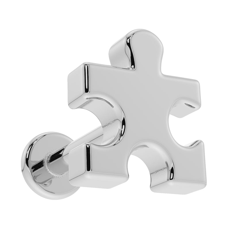 14K white gold puzzle piece flat back earring viewed from below at an angle, highlighting 3D depth of charm