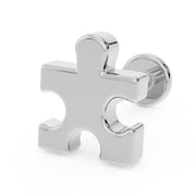 14K white gold puzzle piece flat back labret earring, angled 3/4 view showing post and flat disc backing