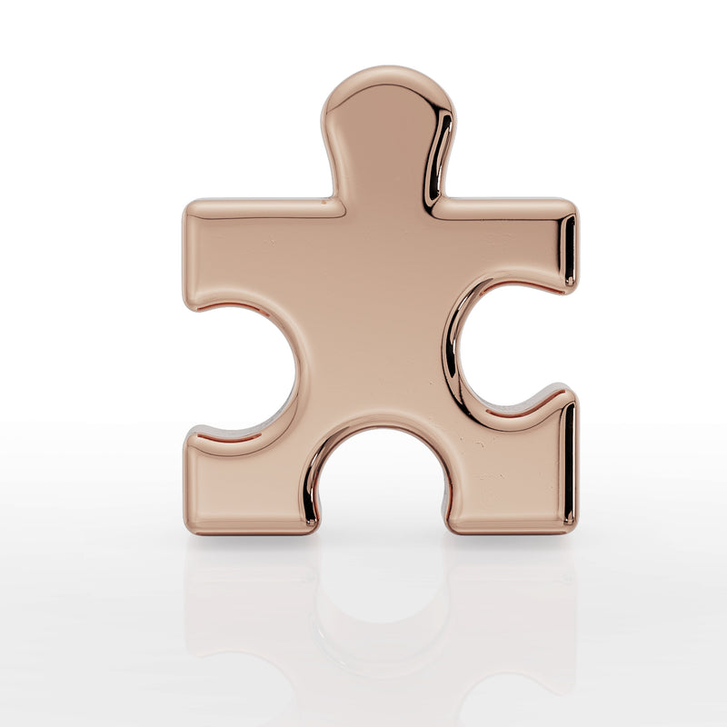 Front view of 14K rose gold puzzle piece charm top, polished finish with rounded interlocking tab detail
