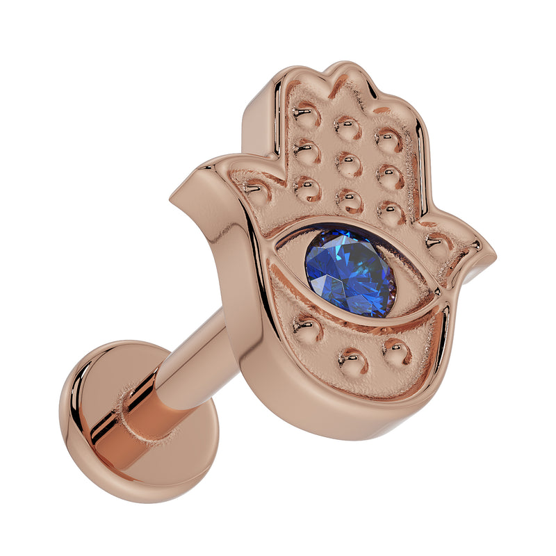 14k rose gold hamsa evil eye flat back labret, left-facing angled view showing beaded texture and sapphire