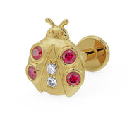 14K yellow gold ladybug flat back earring with garnet and diamond accents, angled view showing flat back disc