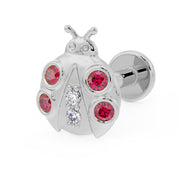 14K white gold ladybug flat back earring with garnet and diamond stones, angled view showing flat disc backing