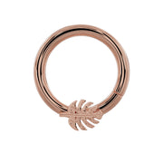 14K rose gold monstera leaf seam ring hoop, front view showing warm-toned leaf charm detail