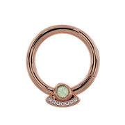 14K rose gold UFO seam ring with white opal center and seven-diamond arc, front view