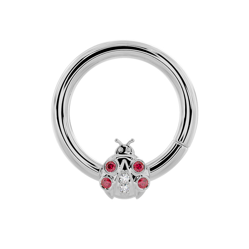 14K white gold ladybug seam ring with garnet and diamond stones, front view