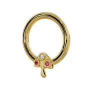 14K yellow gold mushroom seam ring angled view showing ruby and diamond bezel detail on cap