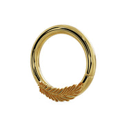 Side profile of 14K yellow gold feather seam ring showing ring depth and feather detail