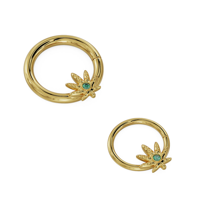 Two 14K yellow gold emerald cannabis leaf seamless hoops shown side by side for size comparison