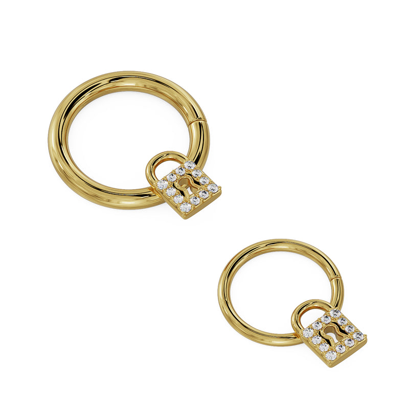 Two sizes of 14k yellow gold diamond lock seam ring hoops shown together for diameter comparison