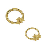 14K yellow gold bee seam ring shown in two sizes for diameter comparison, front view
