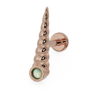 14K rose gold unicorn horn flat back earring angled view with opal bezel accent and flat disc back