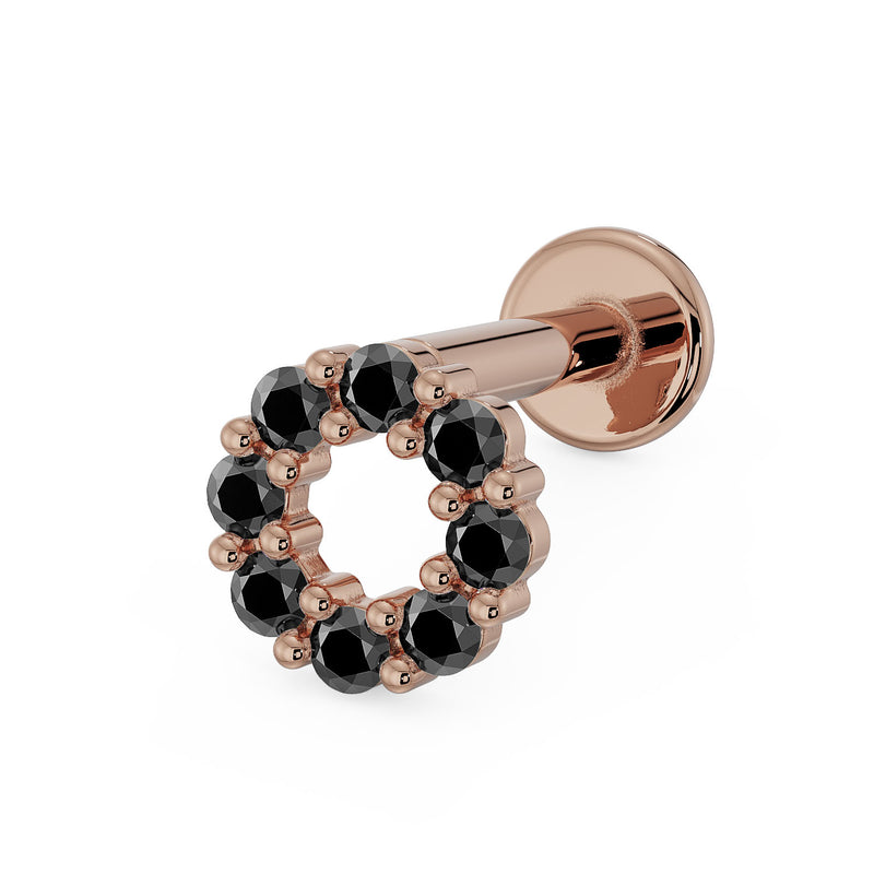 14K rose gold black diamond halo flat back labret, angled view showing warm gold tone with dark stones