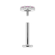 Disassembled 14K white gold pink sapphire flat back labret showing threaded top and post separated