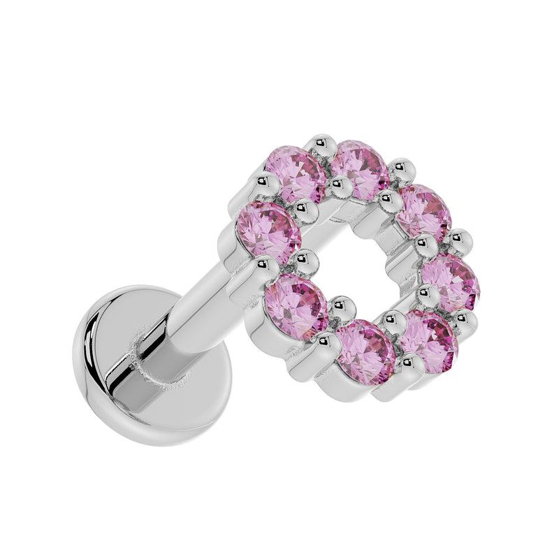 Close angled view of 14K white gold pink sapphire halo labret highlighting sapphire setting depth