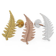 Fern leaf flat back labret earring in all three metal options: 14K yellow gold, rose gold, and white gold side by side