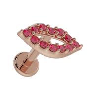 14K rose gold lips flat back labret showing garnet pave detail and flat disc back, tilted front view