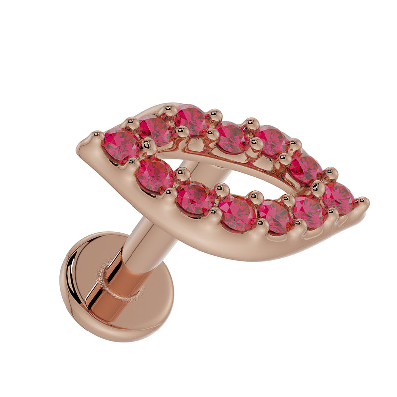14K rose gold lips flat back labret showing garnet pave detail and flat disc back, tilted front view