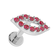 14K white gold lips flat back labret showing garnet pave detail and flat disc back, tilted front view