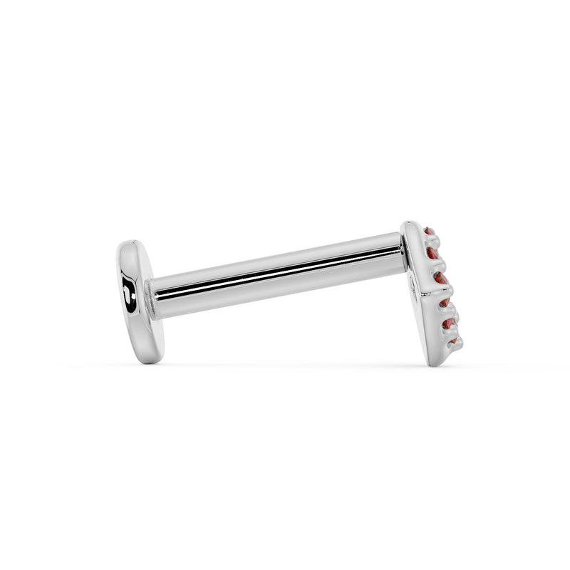 Side profile of 14K white gold lips flat back labret showing barbell length and flat disc backing
