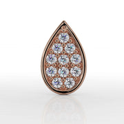 Front close-up of 14k rose gold teardrop labret showing pavé diamond setting and warm rose gold bezel
