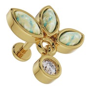 Close-up overhead view of 14K yellow gold opal wildflower labret showing iridescent marquise opal play-of-color