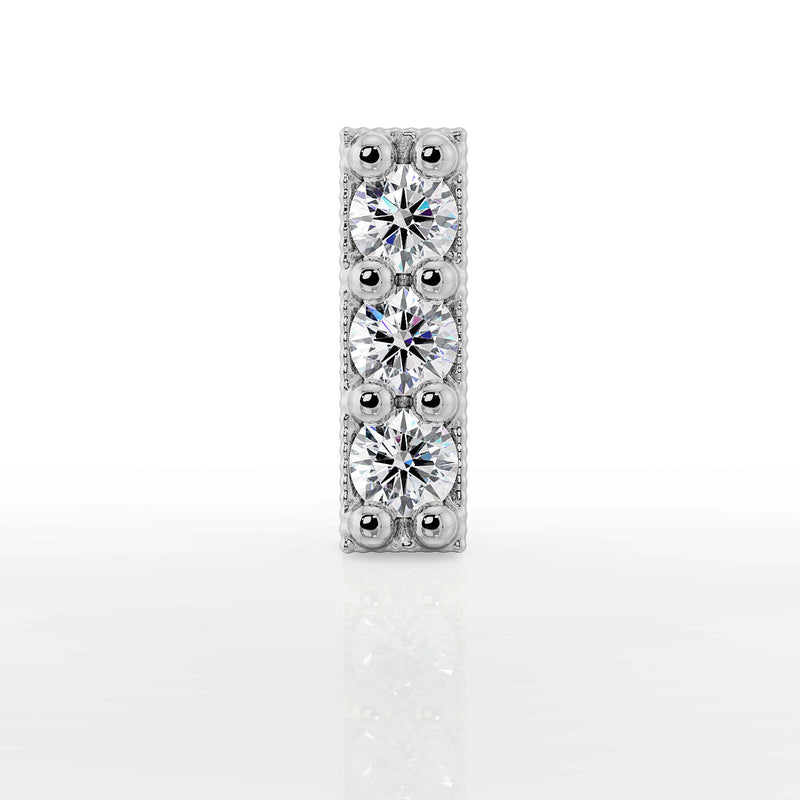 Close-up front view of 14k white gold milgrain trinity diamond bar top showing sparkle and bead setting