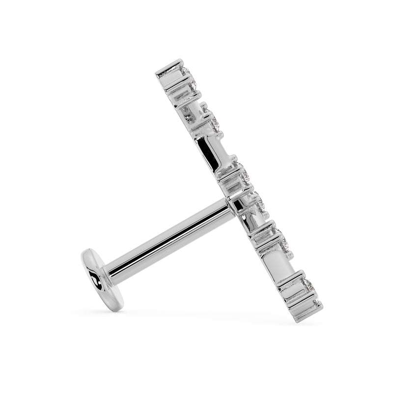 Side profile of 14k white gold Pisces constellation labret showing flat back disc and post length