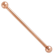 14k rose gold classic industrial barbell with polished ball ends, front view on white background