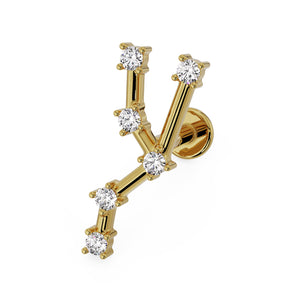 14k yellow gold Taurus constellation flat back labret with CZ stars, angled side view