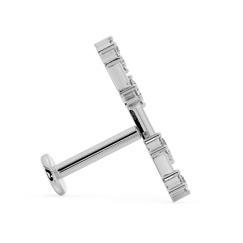 Side profile of 14k white gold Virgo constellation labret showing post length and flat back disc