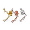 Libra constellation studs in 14k yellow, rose, and white gold showing butterfly backings side by side