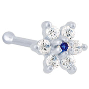 14K white gold 18G flower nose bone with blue sapphire CZ center, angled view on white background