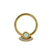 Close-up front view of 14K yellow gold UFO seam ring highlighting opal and diamond charm detail