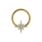 14K yellow gold north star cartilage hoop, larger star charm view showing full diamond pave coverage
