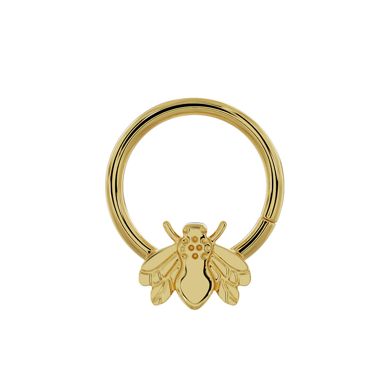 14K yellow gold bee seam ring, slightly elevated front view showing bee charm and seam closure