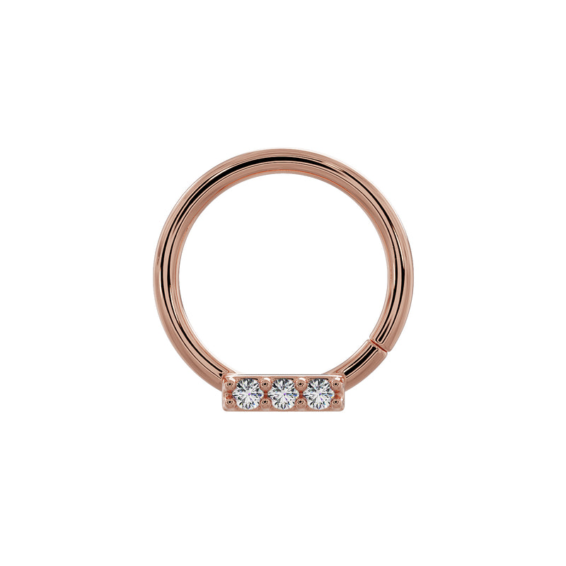 14K rose gold seam ring with three-diamond bar centered at bottom, straight-on view
