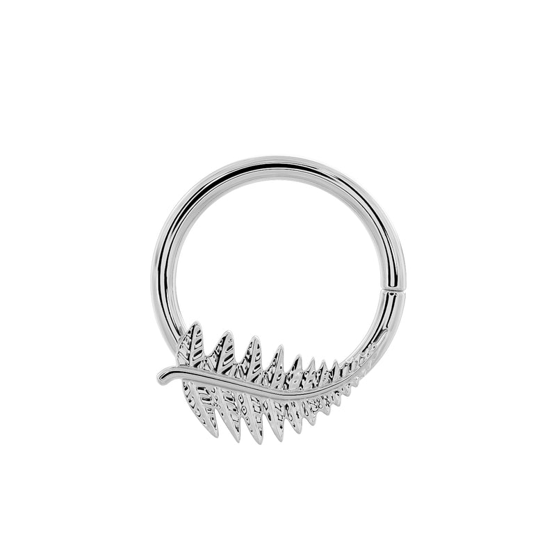 Low-angle view of 14K white gold fern leaf seam ring hoop with detailed frond texture visible