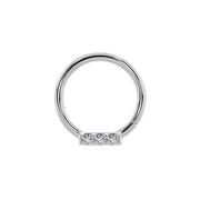 14K white gold seam ring with three-diamond bar centered at bottom, straight-on view