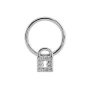 Close-up front view of 14k white gold seam ring highlighting diamond-set padlock charm detail