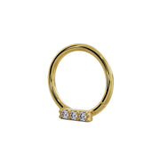 Angled side view of 14K yellow gold trinity diamond seam ring highlighting the diamond bar setting
