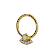 Angled side view of 14K yellow gold opal and diamond UFO seam ring showing charm profile