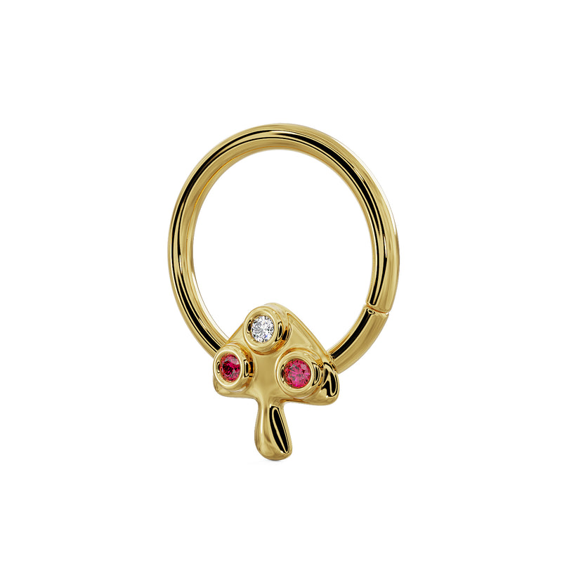 Side-angled view of 14K yellow gold mushroom seam ring showing depth of bezel-set ruby and diamond