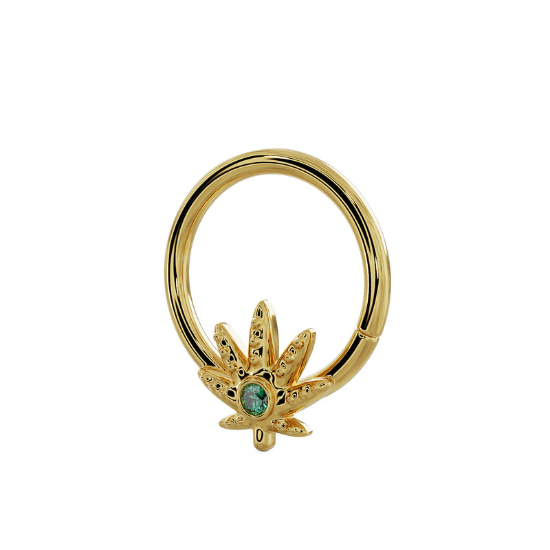 Side-angled view of 14K yellow gold pot leaf seamless hoop showing leaf charm from lower angle