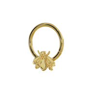 Angled side view of 14K yellow gold bee seam ring showing the hoop profile and bee charm depth