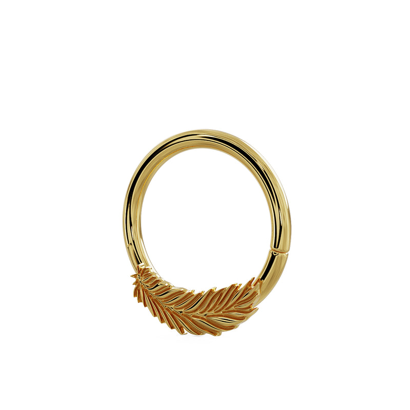 Angled view of 14K yellow gold feather seam ring highlighting the feather detailing and clasp