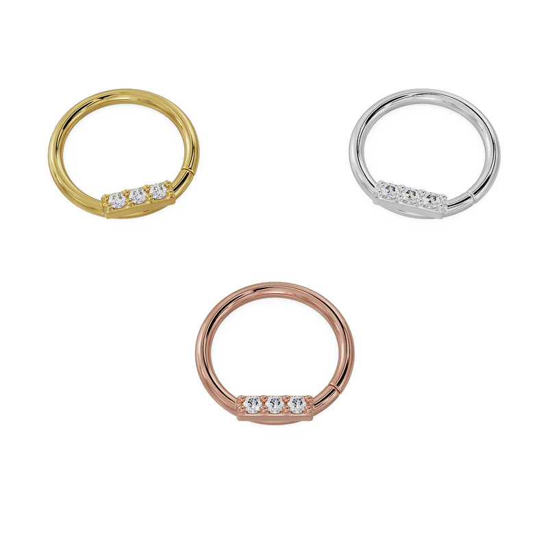 Angled side view of trinity diamond seam ring in yellow gold, white gold, and rose gold variants