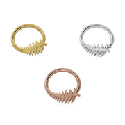 Left-facing fern leaf orientation shown in yellow, white, and rose 14K gold seam ring hoops
