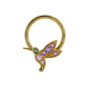 14K yellow gold hummingbird seam ring angled left, showing gemstone wing and body detail